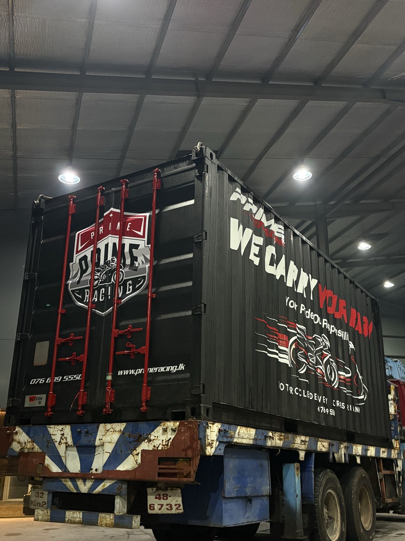 Finished Prime Racing container loaded on a truck for delivery